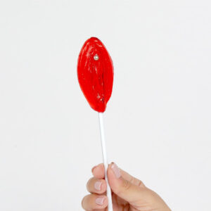 Sucette en forme de vulve fraise